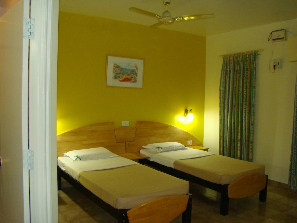 Tom'S Hotel Bangalore Værelse billede